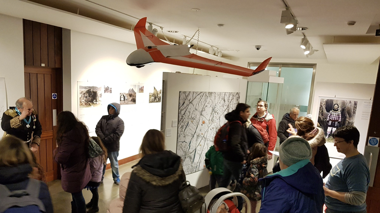 People exploring a museum exhibit.